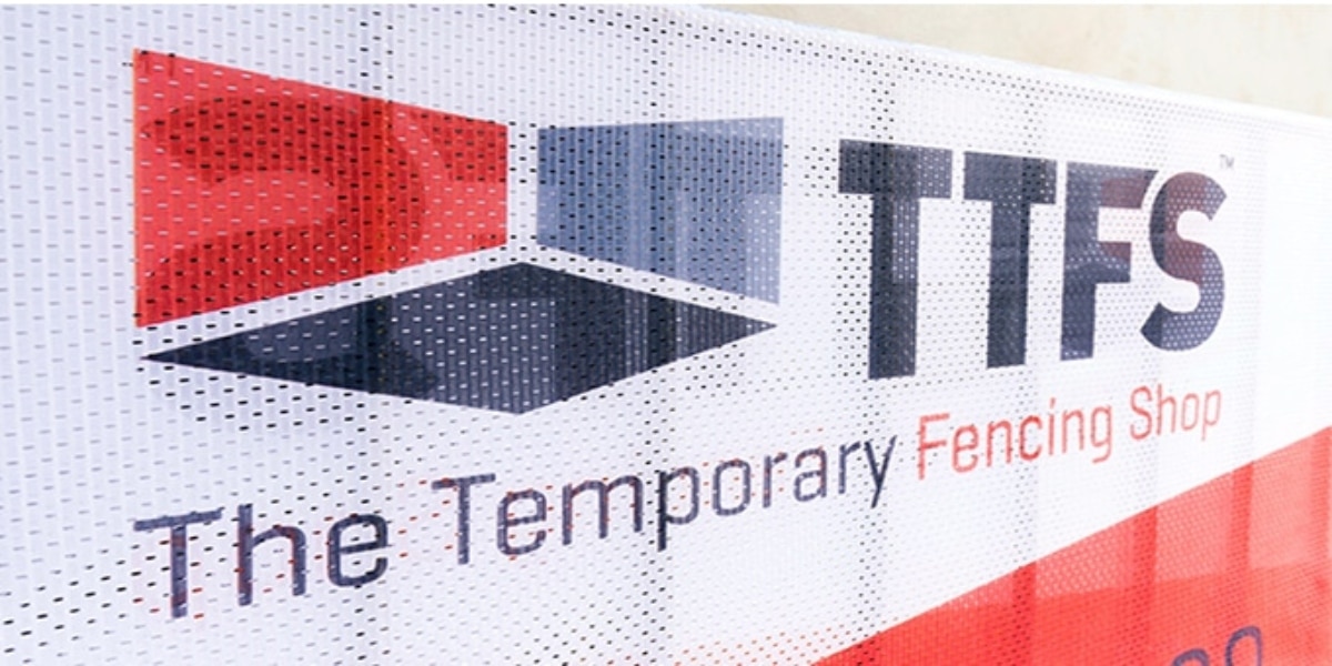 Custom printed banner mesh signage, with TTFS logo.