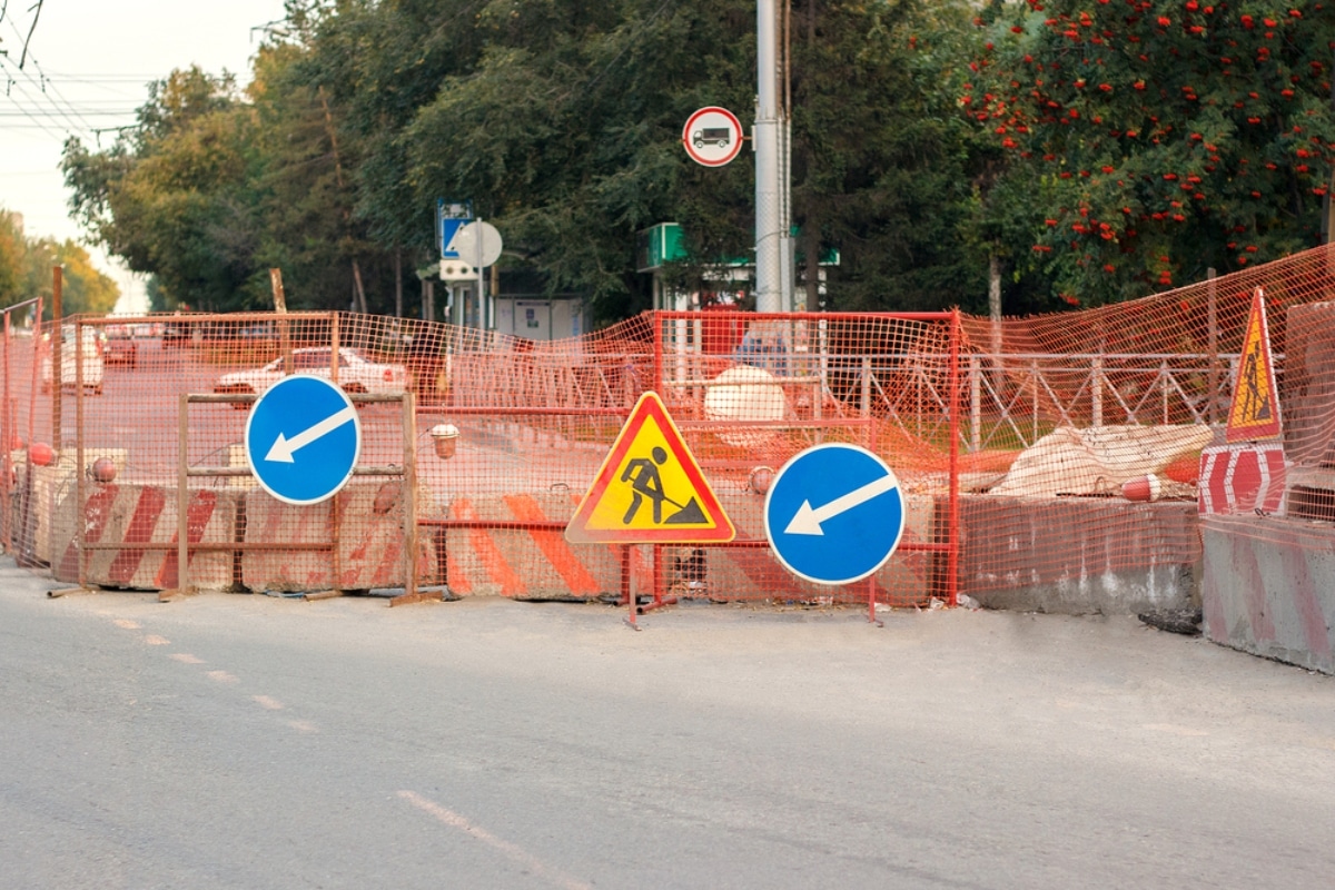 Signage around construction site for traffic management.