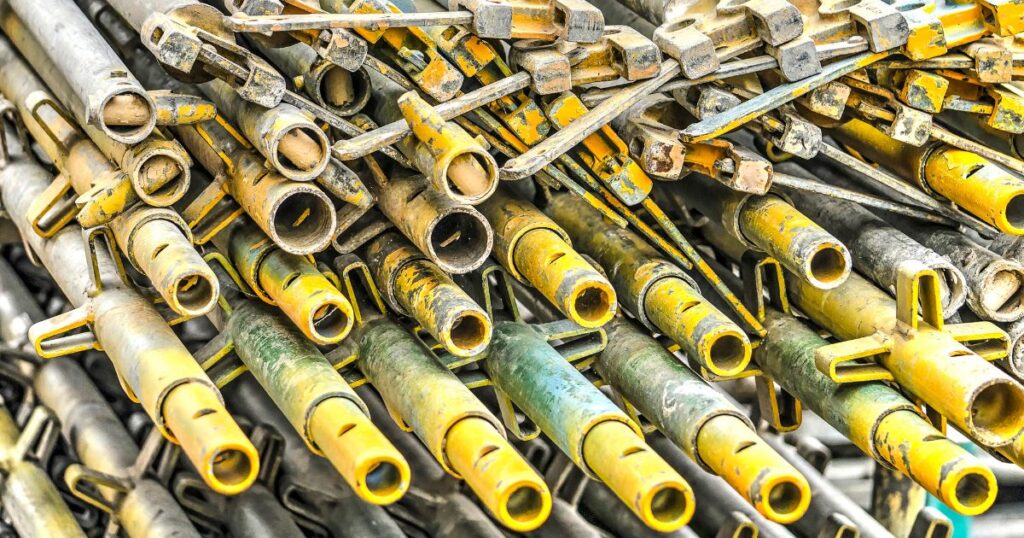 Top 10 Scaffolding Parts All Builders Should Know for Safe Construction 1 Yellow scaffold tubes are the backbone of any scaffolding structure, providing the primary framework on which all other components are fixed.